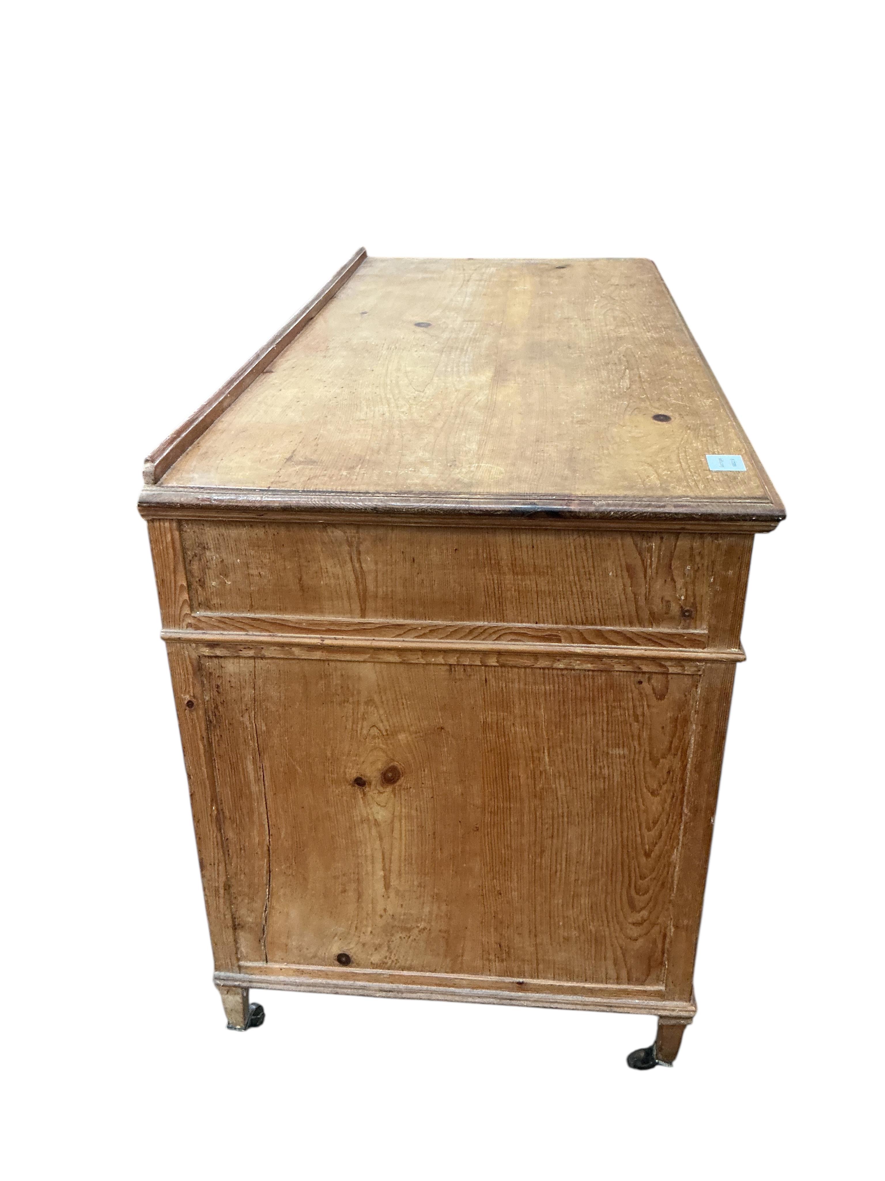 An early 20th century mahogany and pine pedestal desk, width 122cm, depth 56cm, height 78cm